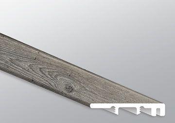 Close-up of Mezcla plank surface showcasing charcoal wood knots and textured matte finish