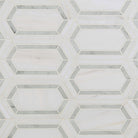 Close-up view showing polished marble texture and fine picket waterjet design