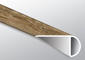 Close-up of Ryder LVT surface with dark knots and authentic wood grain texture