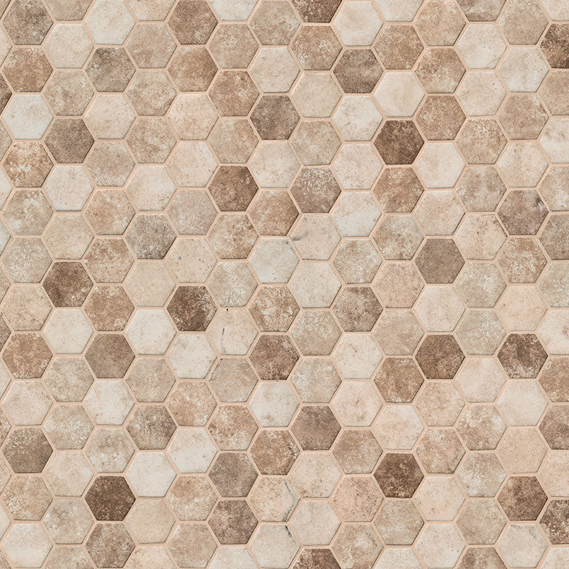 Close-up of Sandhills Mosaic showing 2-inch hex chips in warm desert-inspired tones
