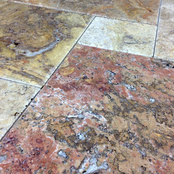 Close-up of brushed and chiseled surface texture with red-gold color blend