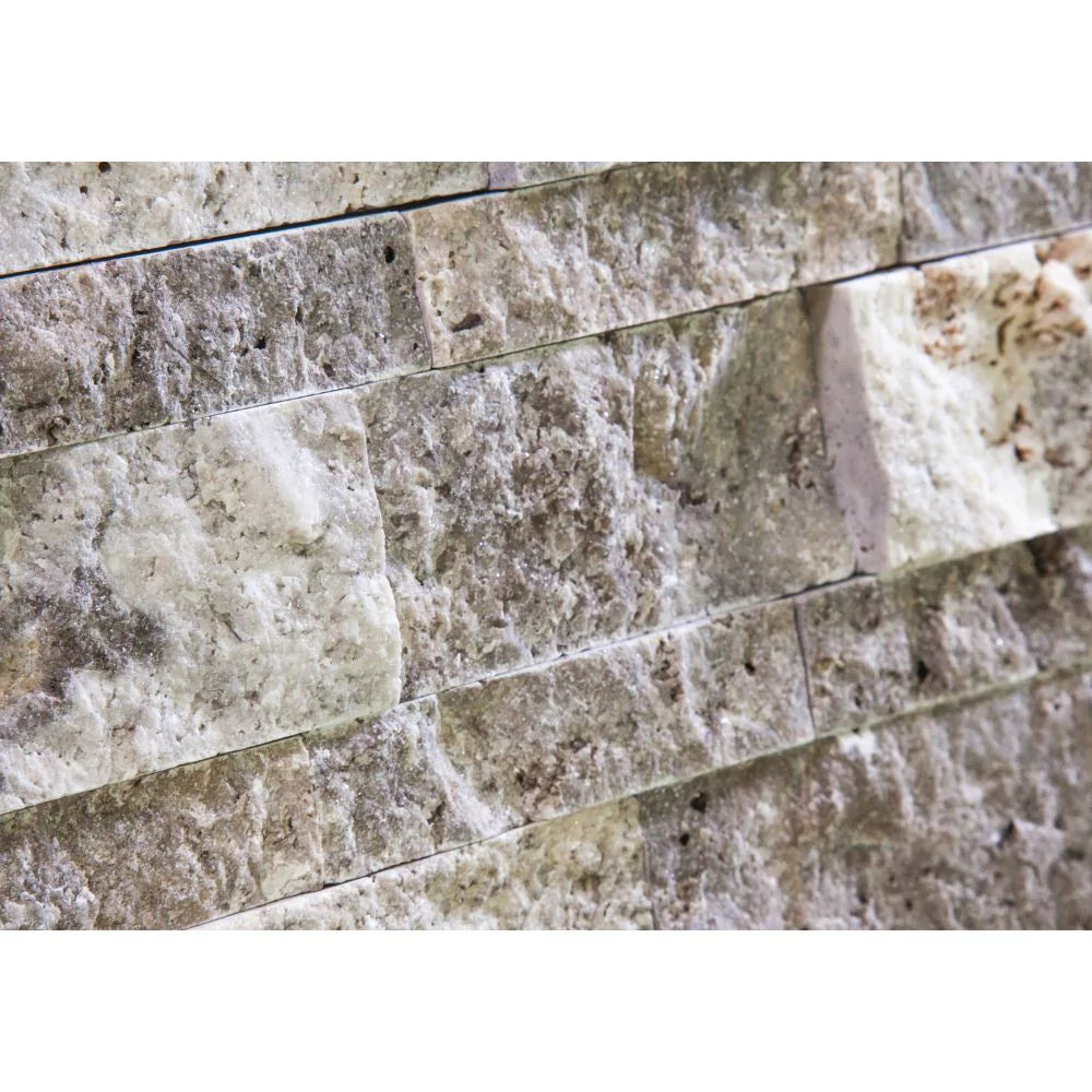 Close-up of Silver Travertine Stacked Stone Panel with rugged texture and color blend