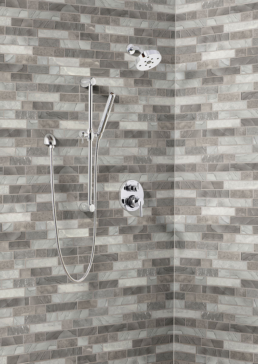 Close-up of Tarvos Mosaic showing linear recycled glass tiles with soft directional veining