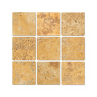 Flat lay of Tuscany Gold Travertine 4x4 Tumbled Tile with natural stone texture