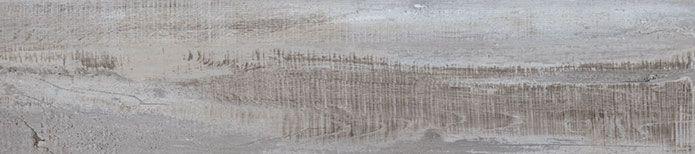 Close-up of Weathered Brina vinyl plank surface highlighting wood grain knots and matte finish