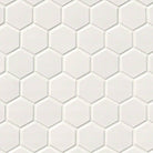 Flat lay of White 2-Inch Hexagon Porcelain Mosaic in glossy cream finish on mesh sheet