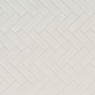 Flat view of White Herringbone Porcelain Mosaic with creamy white glossy finish on mesh sheet