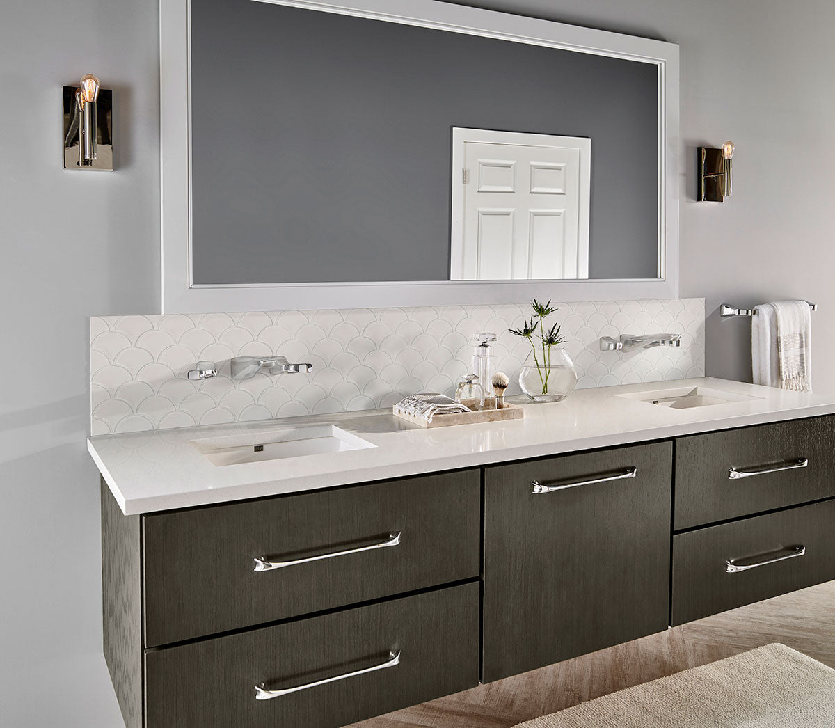 Close-up of scallop porcelain tile showing glossy glazed surface and curved silhouette