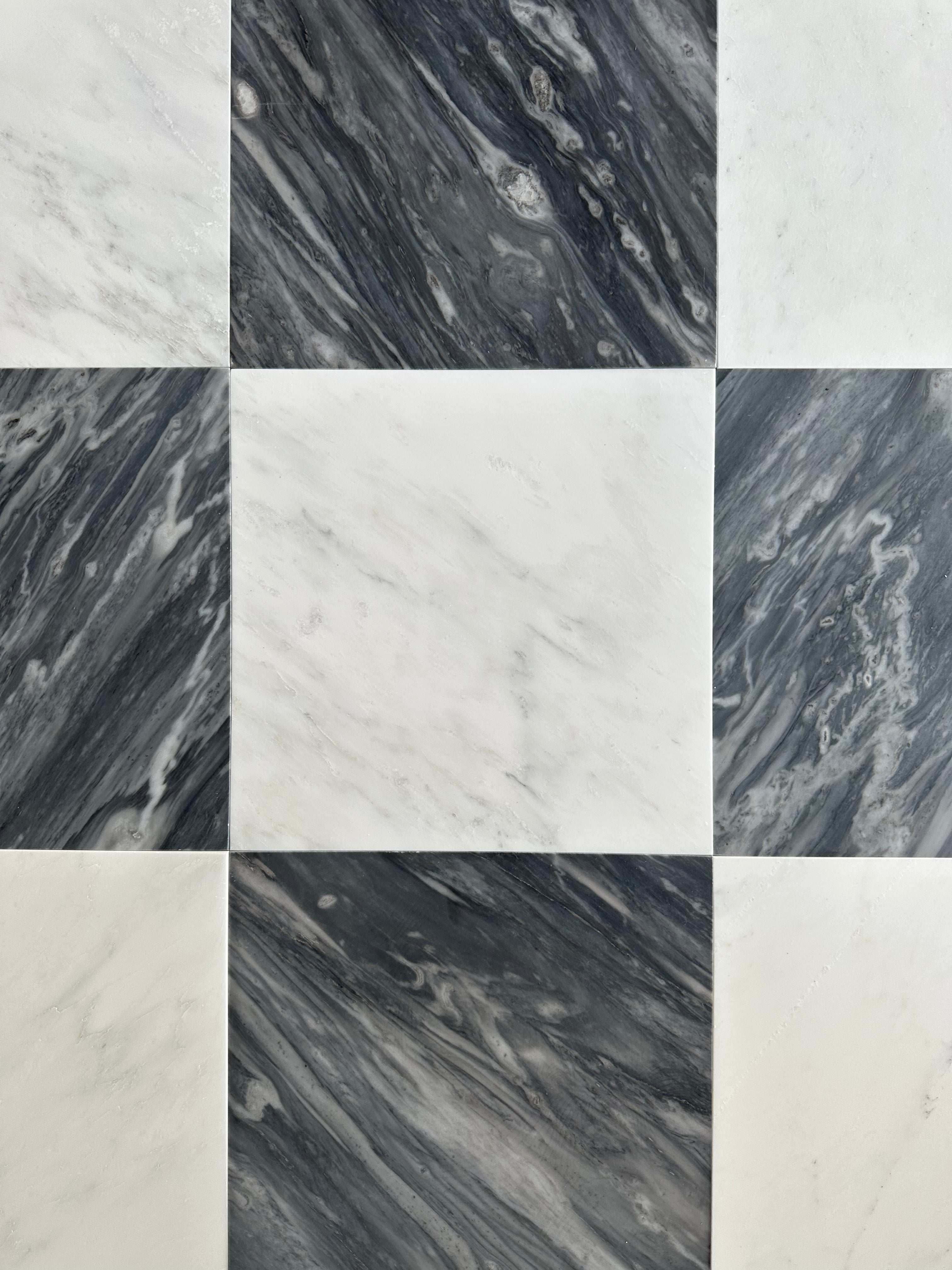 Checkerboard natural stone tile floor with black and white marble squares in a classic entryway  