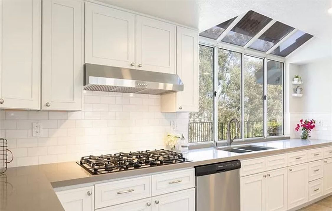 Thassos White Marble tiles and mosaics in various shapes and finishes on display