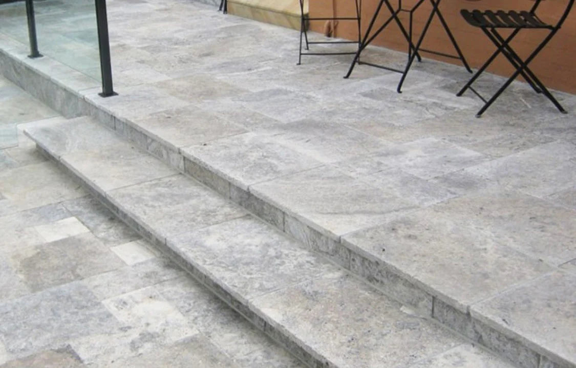 Installed Silver Travertine on modern patio flooring