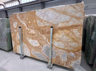 Golden Dune Marble Slab in polished finish showing gold, ivory, and gray tones