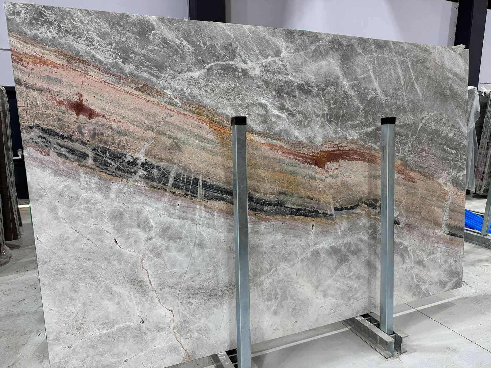 Strata Mist Marble Slab in polished finish showing silver-gray tones and horizontal veining