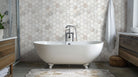 Arabescato Venato White hexagon tile installed as bathroom floor and wall feature