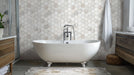 Arabescato Venato White hexagon tile installed as bathroom floor and wall feature