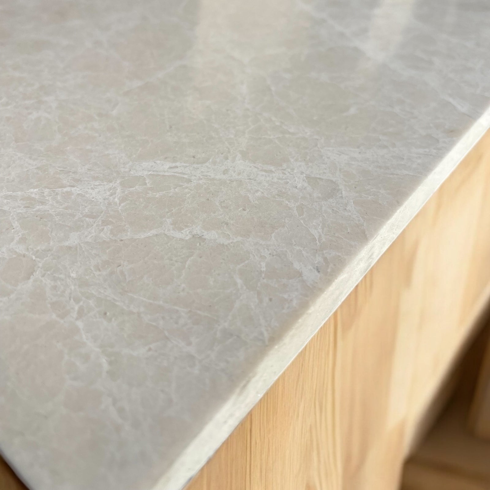 Close-up detail of polished Botticino marble surface texture