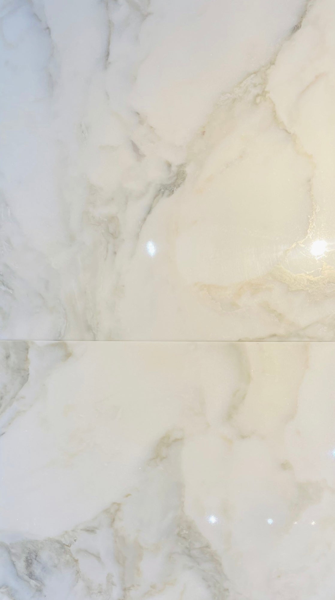 Close-up of Calacatta 18x18 Marble Tile highlighting polished surface and natural veining