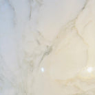 Close-up of Calacatta 18x18 Marble Tile highlighting polished surface and natural veining
