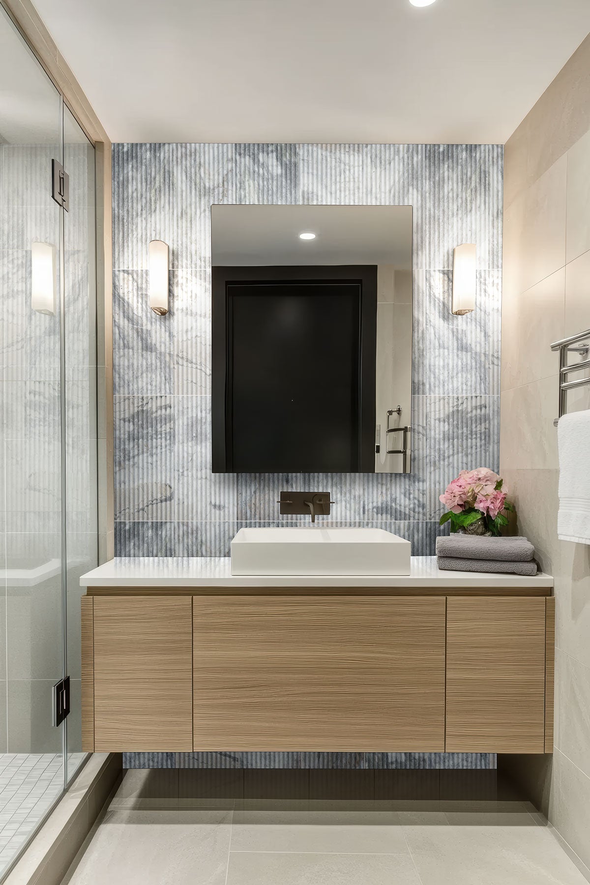 Capri Blue Milano Ribbo Marble Tiles installed on bathroom wall with honed finish