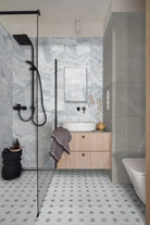 Capri Blue Valentino Fluto Marble Tiles installed on bathroom wall with honed finish