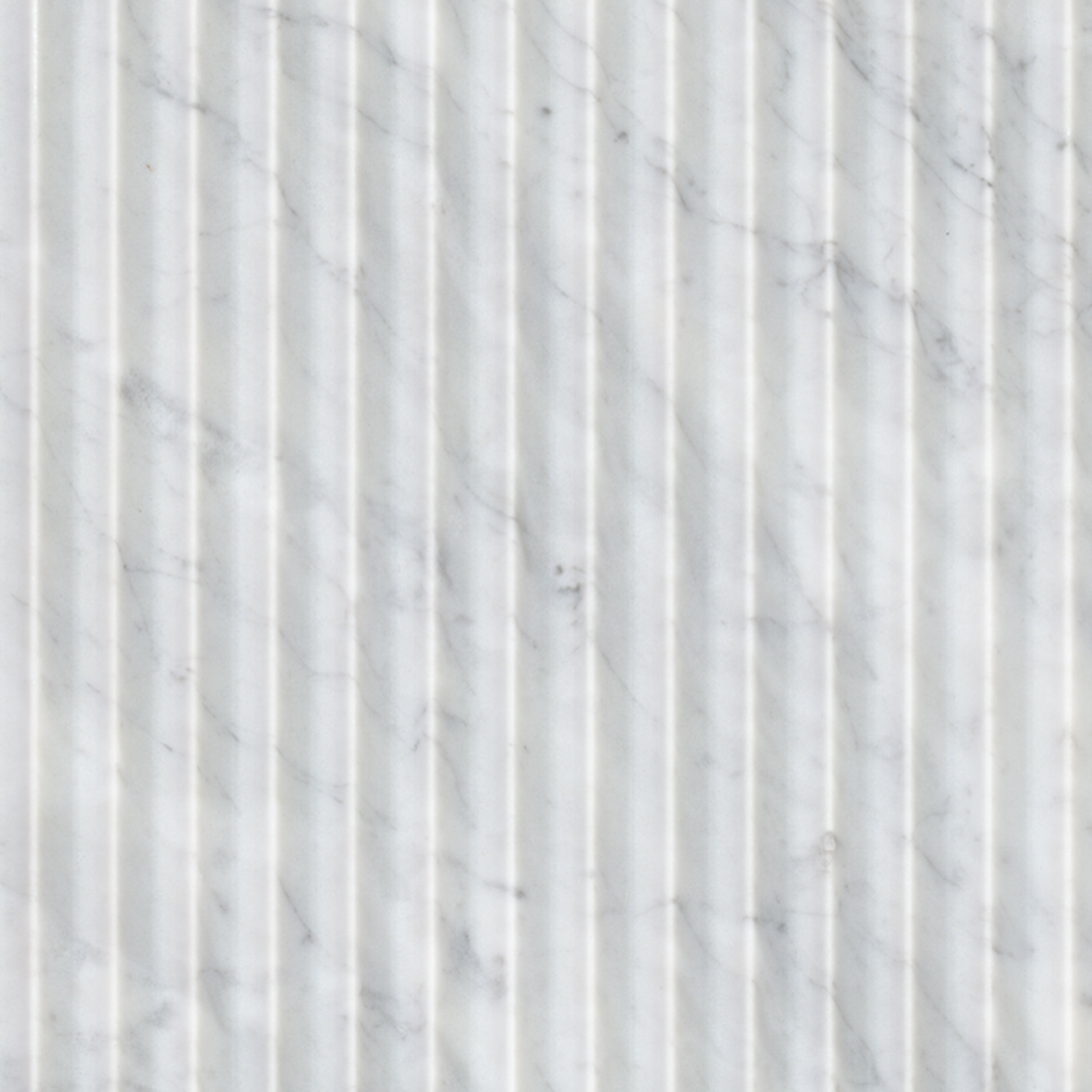 Flat view of Carrara White Valentino Fluto Marble Tile, 12x24 honed with concave ribbed design