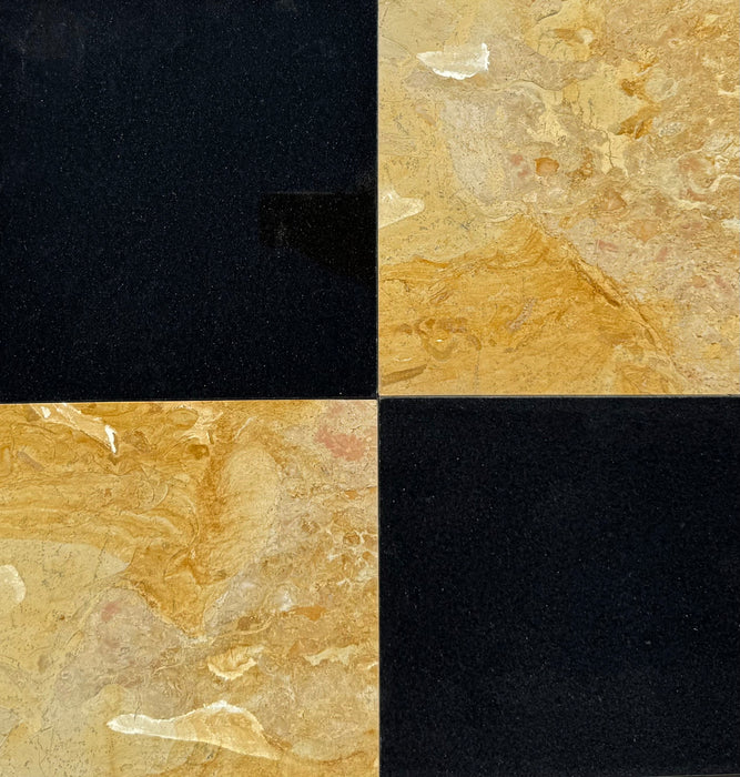 Close-up of checkerboard marble tile with white Calacatta and golden Giallo Reale finish