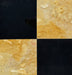 Close-up of checkerboard marble tile with white Calacatta and golden Giallo Reale finish