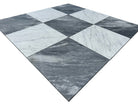 Close-up of Checkerboard Carrara and Bardiglio Marble tile showing contrast and fine marble veining