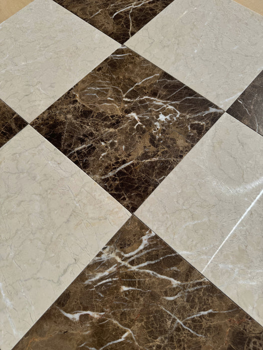 Close-up of Checkerboard Cream Nouva and Dark Emperador marble tiles with polished finish
