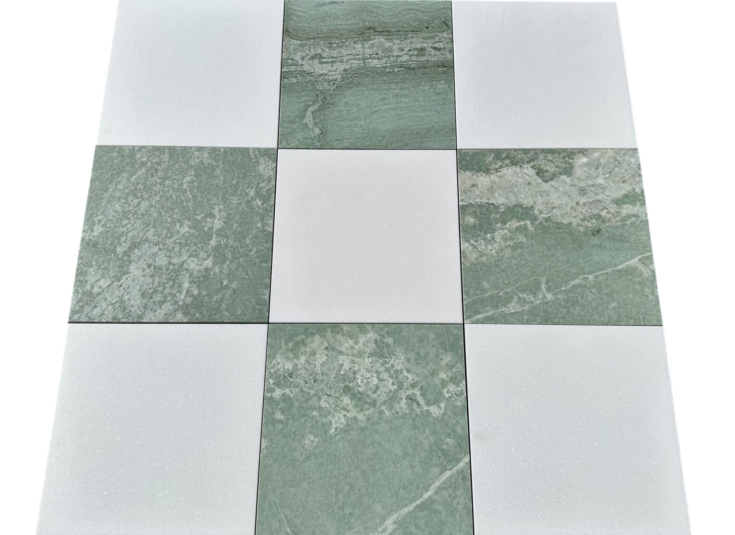 Close-up showing the texture of Ming Green and Thassos marble in checkerboard design