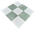 Close-up showing the texture of Ming Green and Thassos marble in checkerboard design