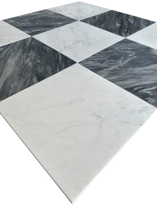 Close-up of Nuvolato and Statuary White marble checkerboard tile showing soft gray and white contrast