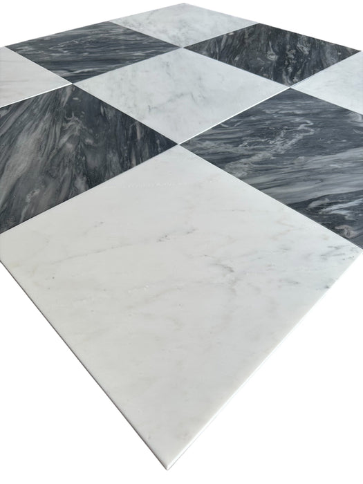 Close-up of Nuvolato and Statuary White marble checkerboard tile showing soft gray and white contrast