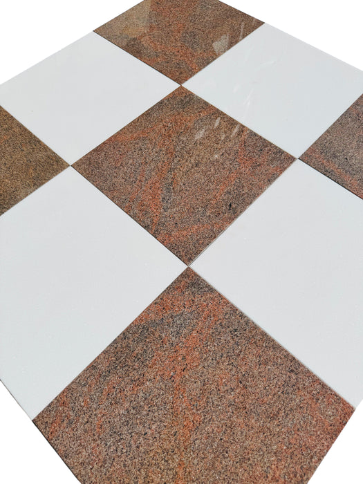 Close-up of checkerboard tile with bright Thassos marble and burgundy Bordeaux granite squares