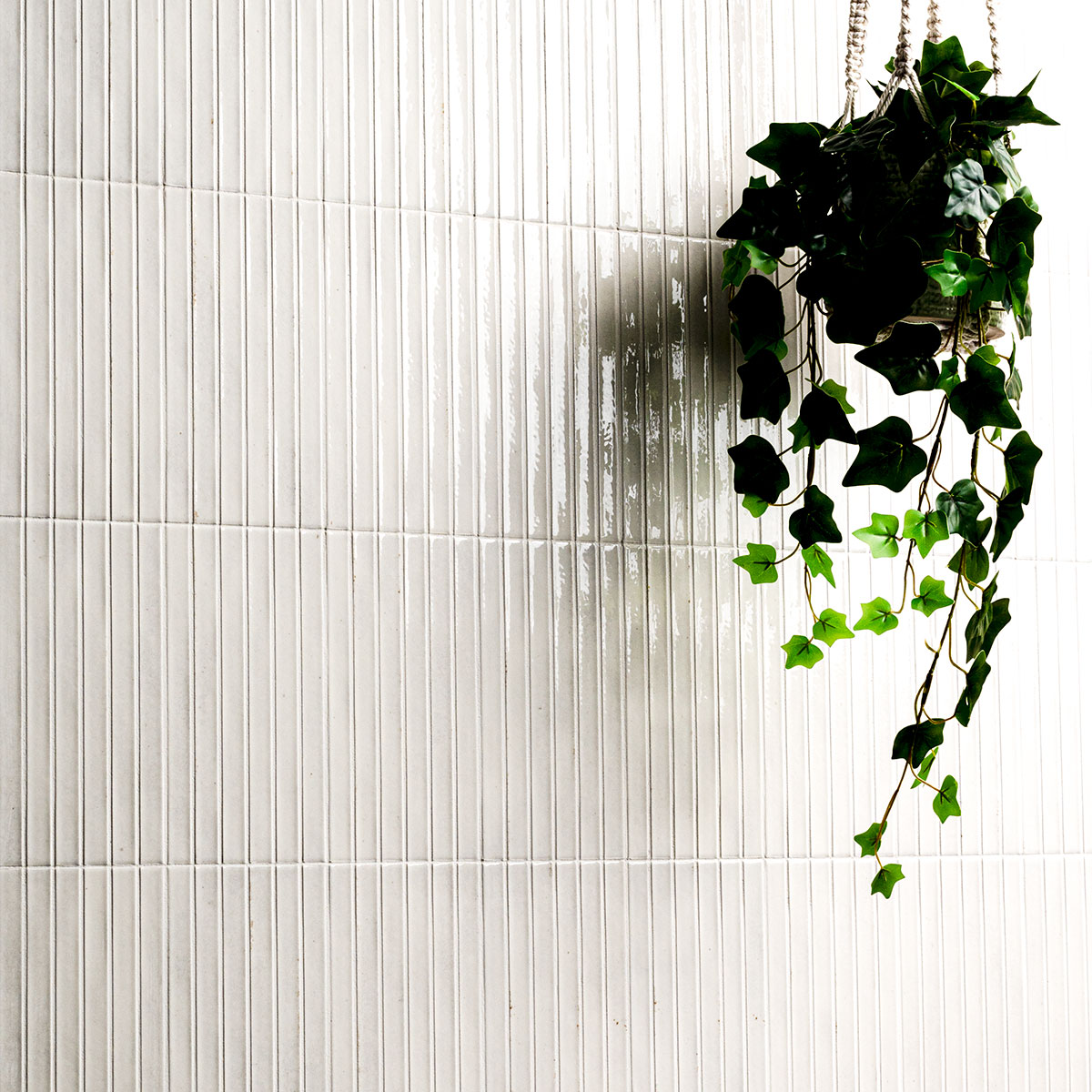 Gems Bianco Fluted Tiles installed on feature wall with seamless grout finish