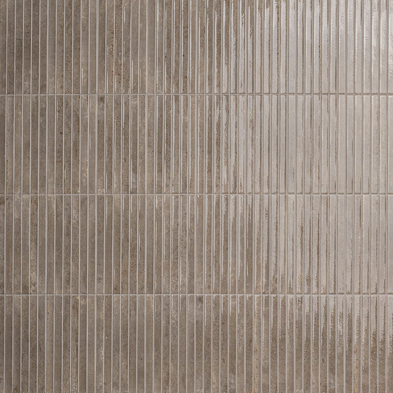 Flat view of Gems Grigio Fluted Tile, 5x10 porcelain with glossy finish and pre-scored fluted design