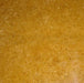 Close-up of Inca Gold Marble 18x18 tile showing warm golden veining on polished surface
