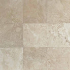 Ivory Travertine 12x12 Honed Tile showing matte finish and natural texture