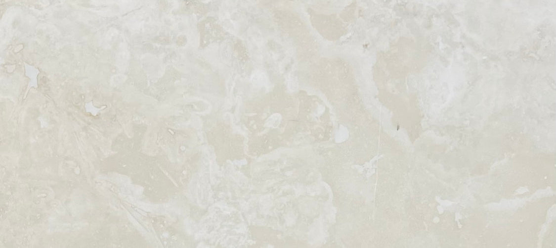 Flat view of Ivory Travertine Tile in honed and filled finish, 12x24 size with cream tones