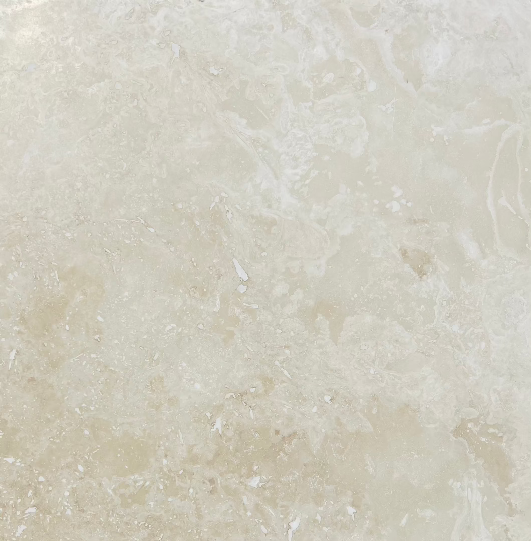 Flat view of Ivory Travertine Tile in honed finish, 18x18 size with beige and ivory tones