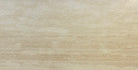 Close-up of Ivory Vein Cut Travertine showing horizontal striations and smooth finish