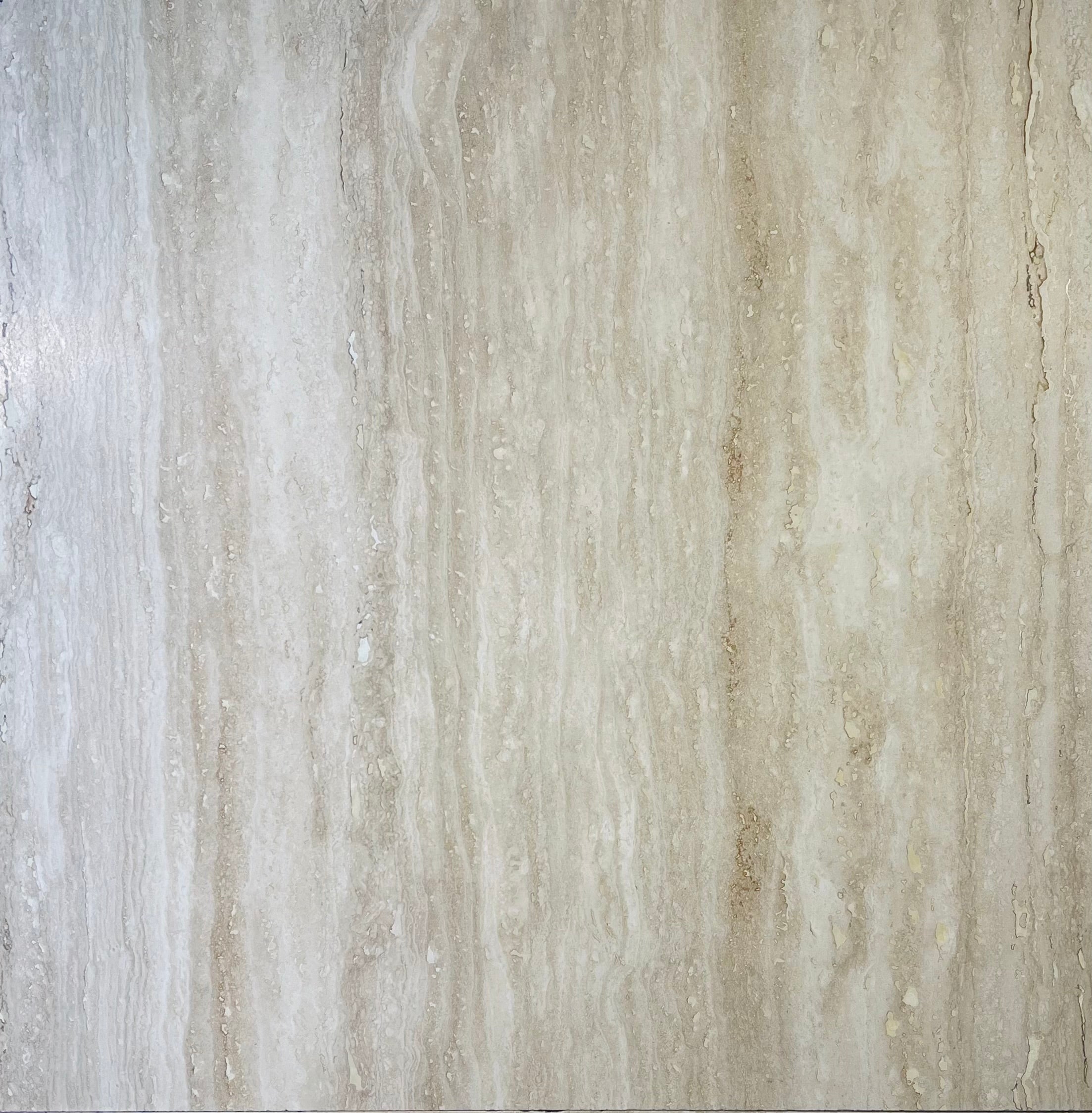 Flat lay of Ivory Vein Cut Travertine 18x18 with honed finish and cream ivory tones