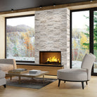 Mayra White XL Limestone Panels installed on indoor accent wall with split-face finish