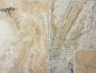 Close-up of Picasso Travertine showing natural variation and chiseled edge detail