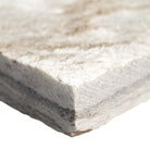 Close-up of Royal White Quartzite showing split-face texture and soft beige veining