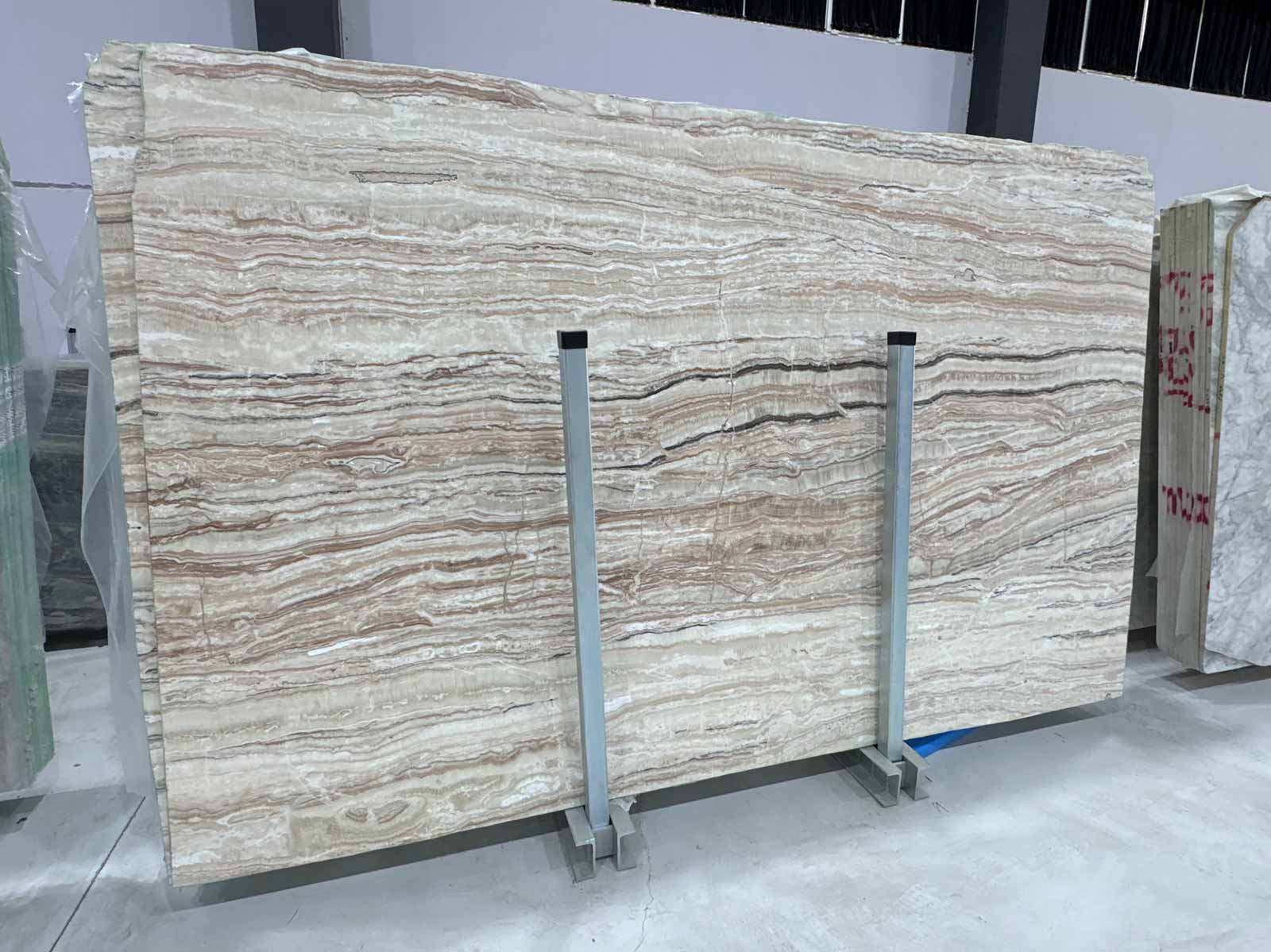 Sand Drift Marble Slab showing layered texture and matte honed surface