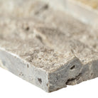 Close-up of Silver Travertine showing soft gray tones and natural texture