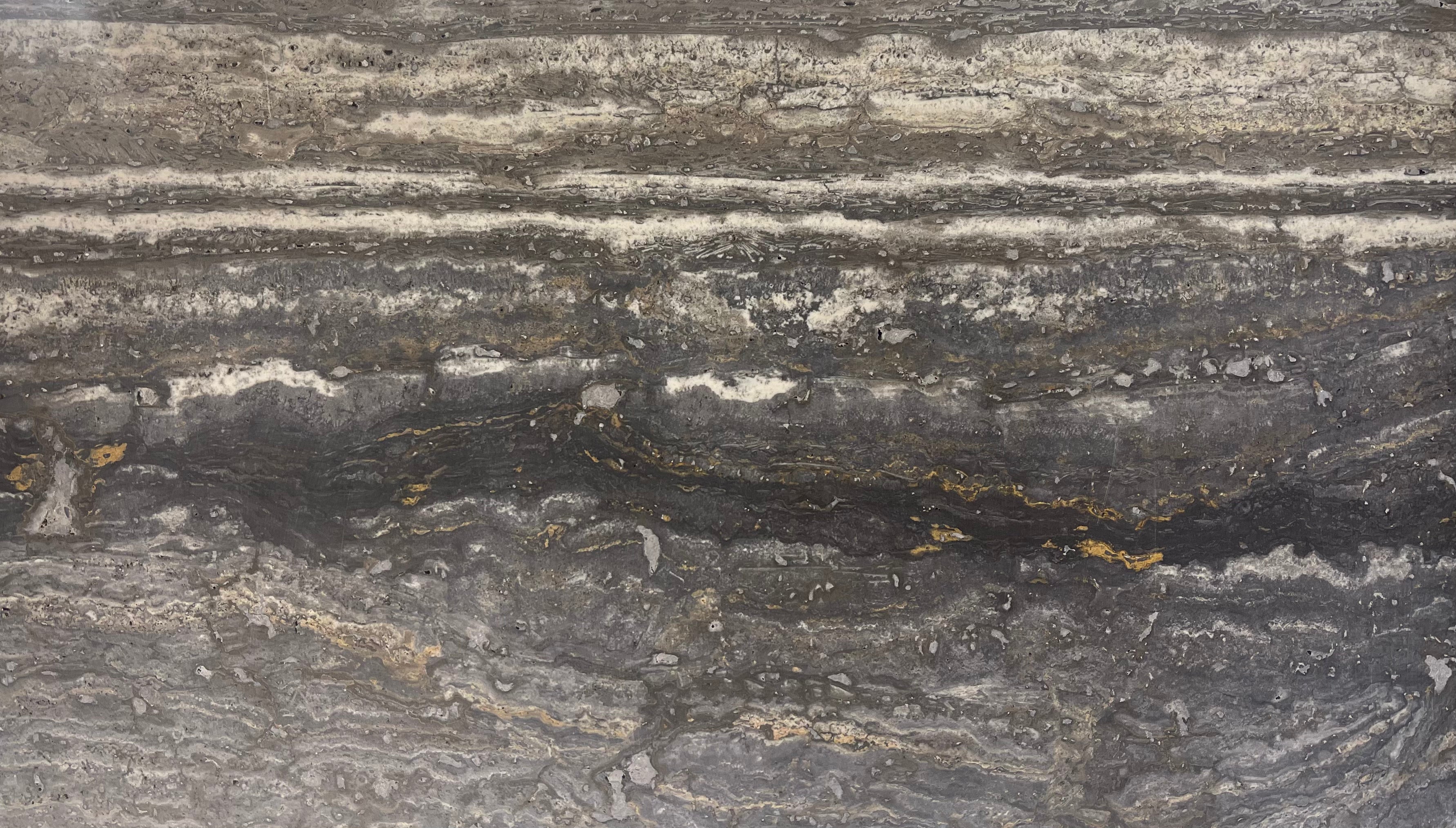 Close-up of Silver Veincut Travertine showing filled surface and veined texture