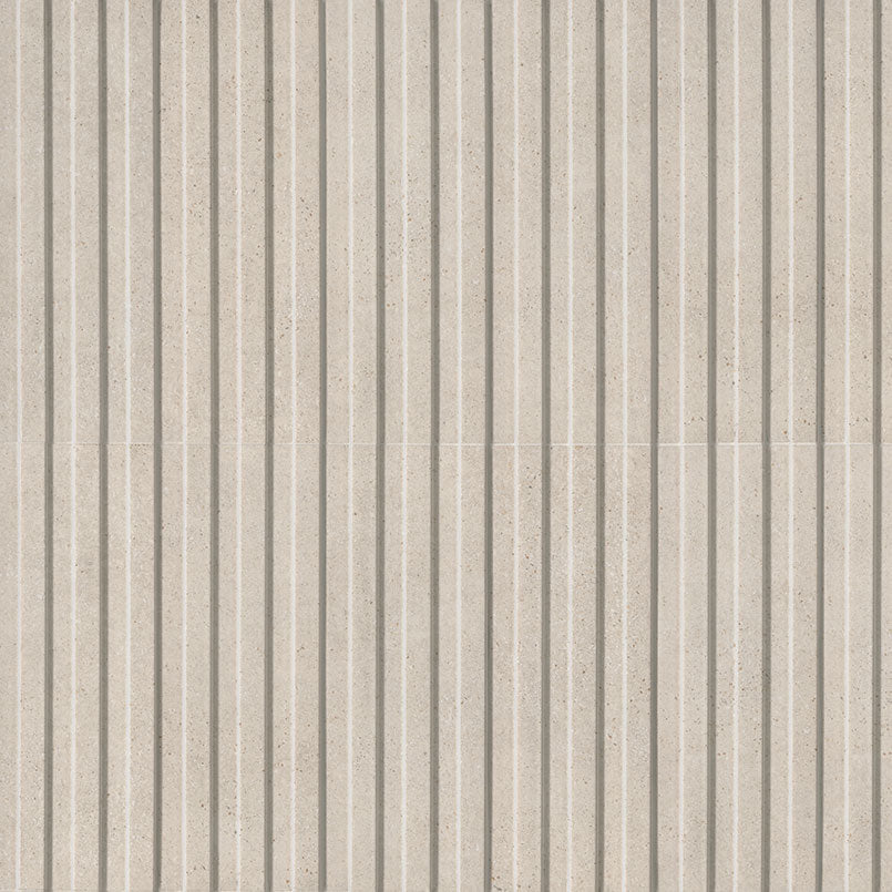 Flat view of Sinfonia Hip Hop Arena Fluted Tile with matte finish and limestone-look texture