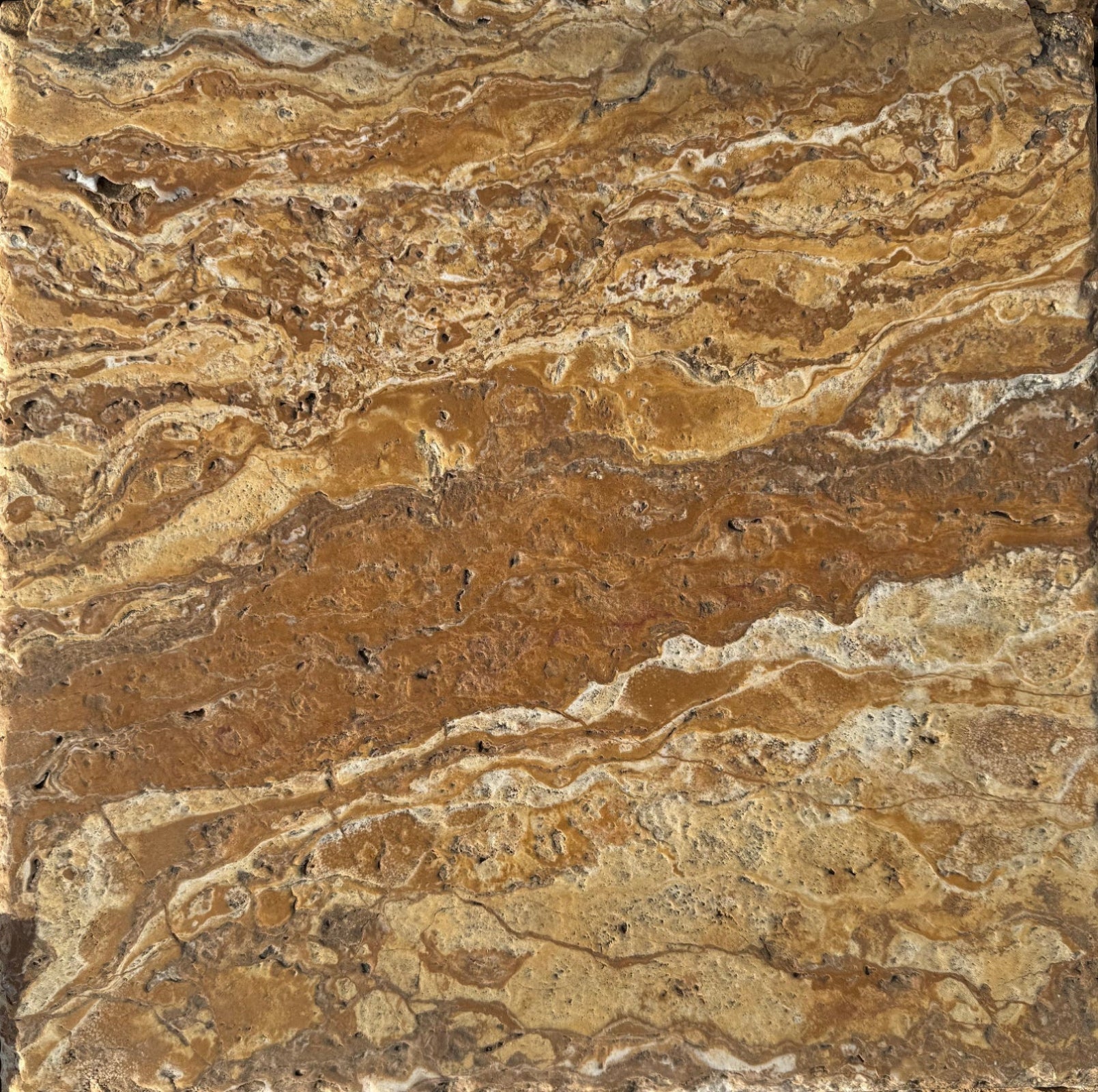 Tuscany Gold Travertine Tile 18x18 with chiseled edges and brushed finish in warm tan and gold tones